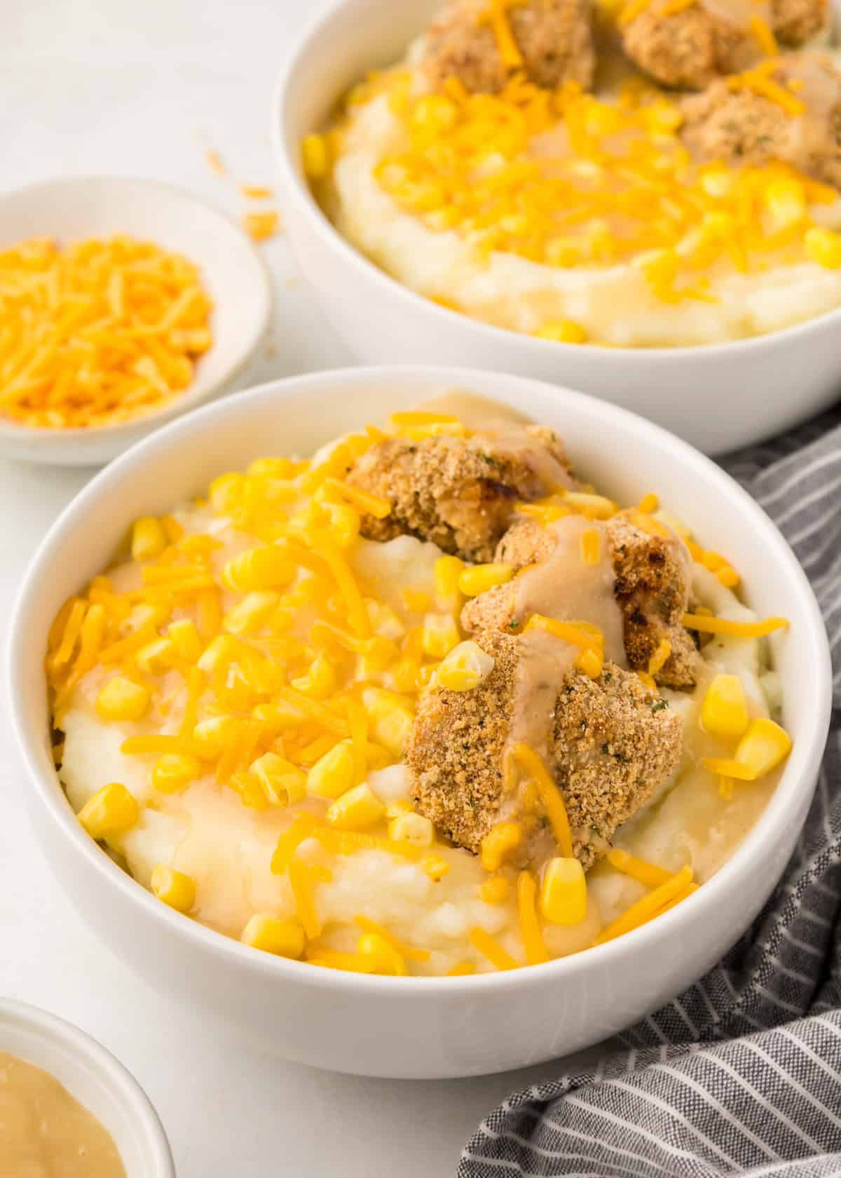 Homemade kfc famous bowl, served in white bowl.