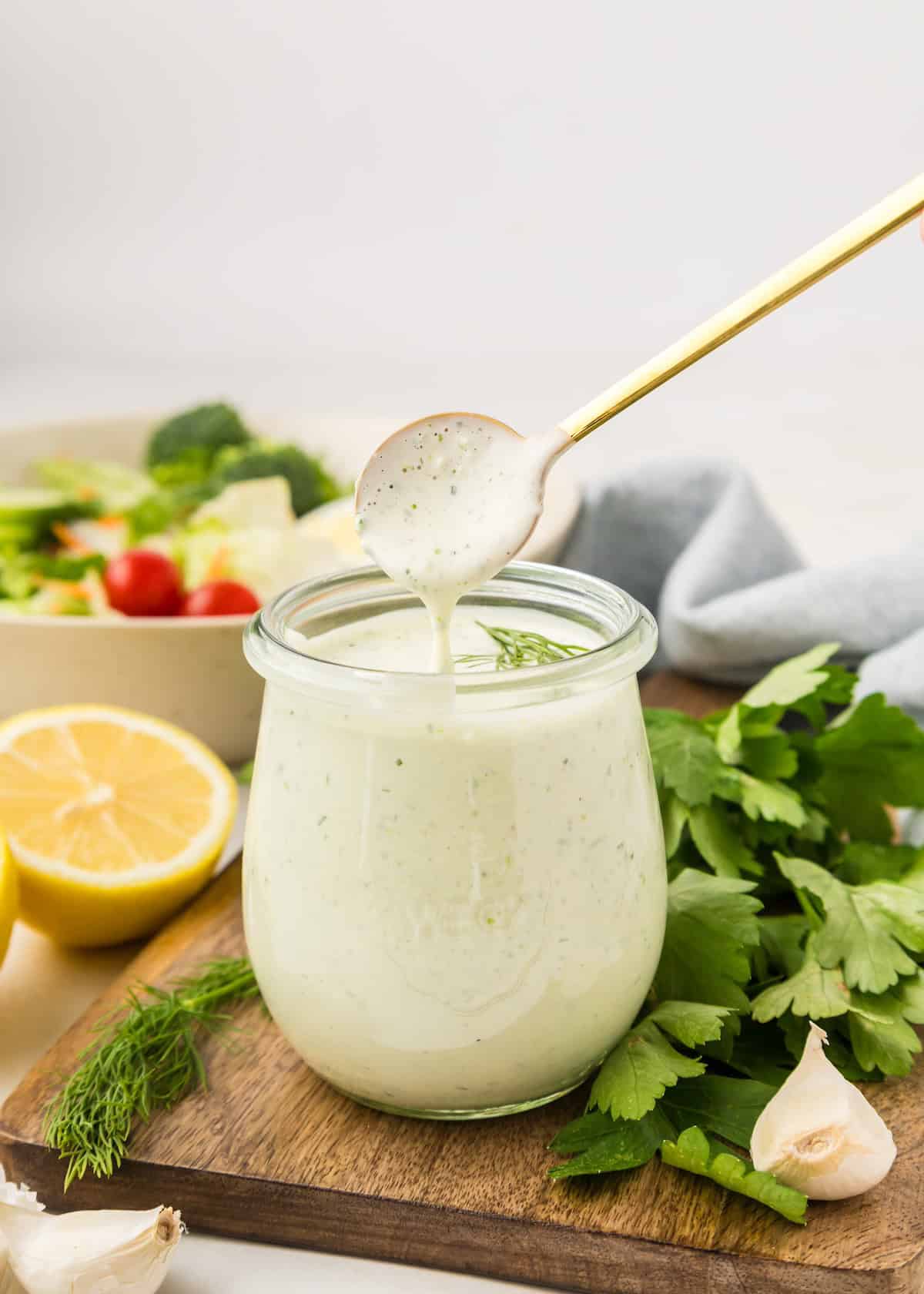 spooning out homemade ranch dressing