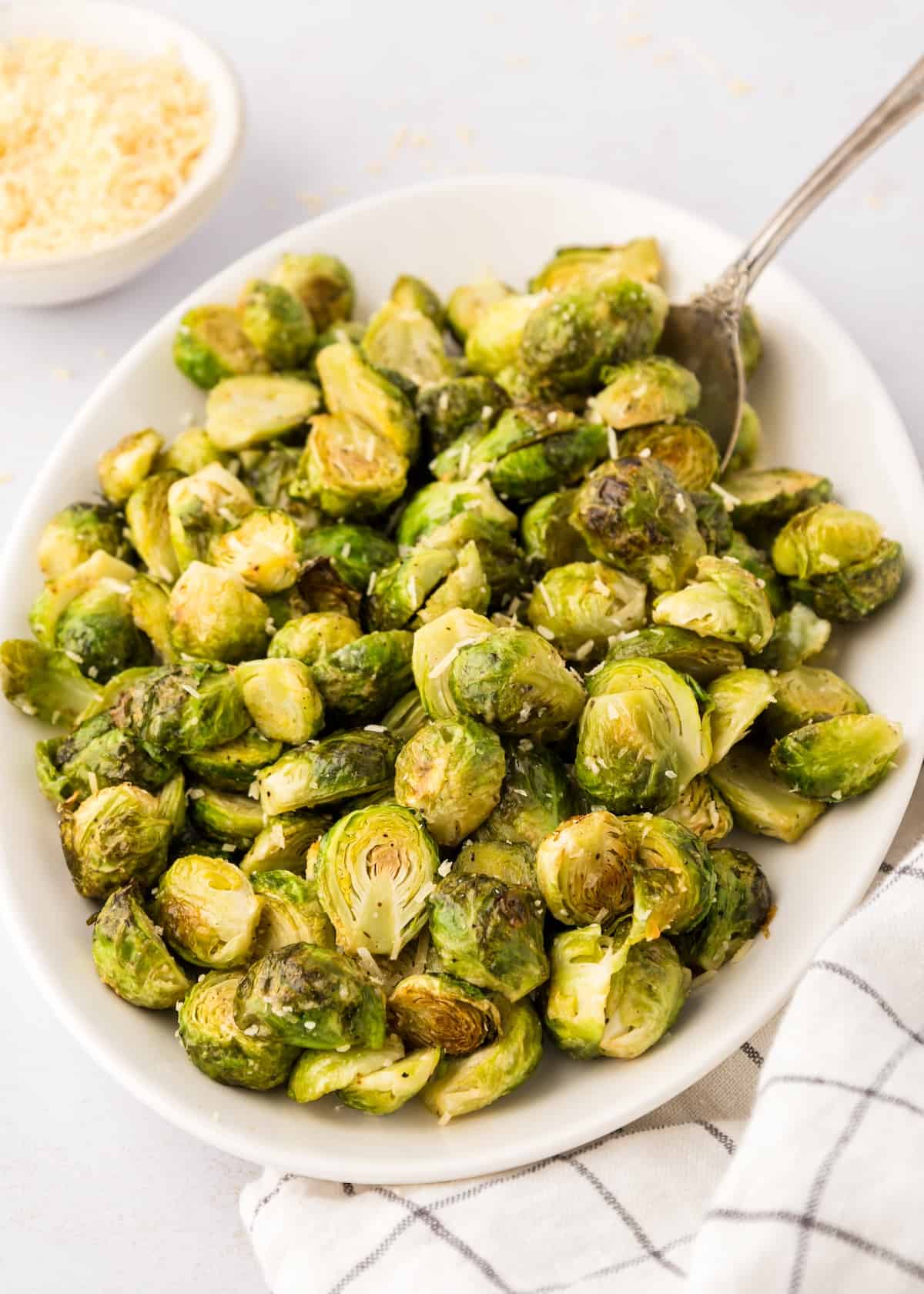parmesan roasted brussels sprouts in serving dish
