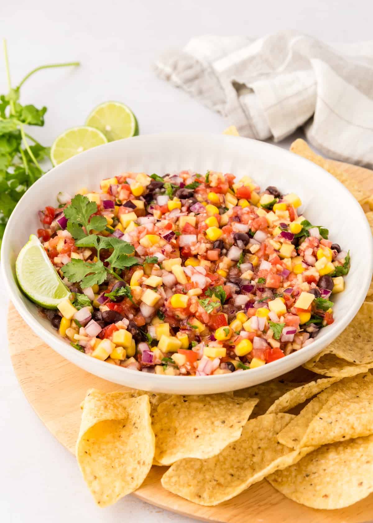 Summer salsa served with tortilla chips.