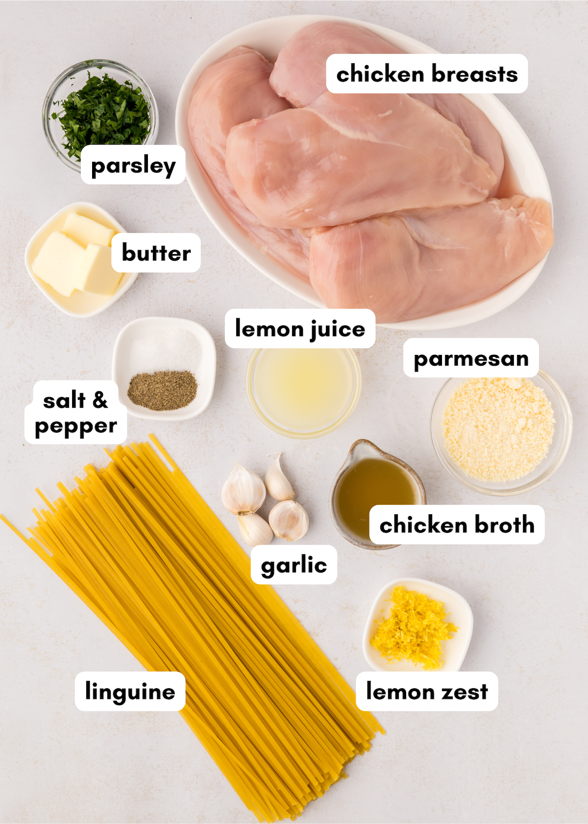 Lemon Chicken Pasta with linguine, parmesan, garlic, broth, parsley, and fresh lemon flavor.