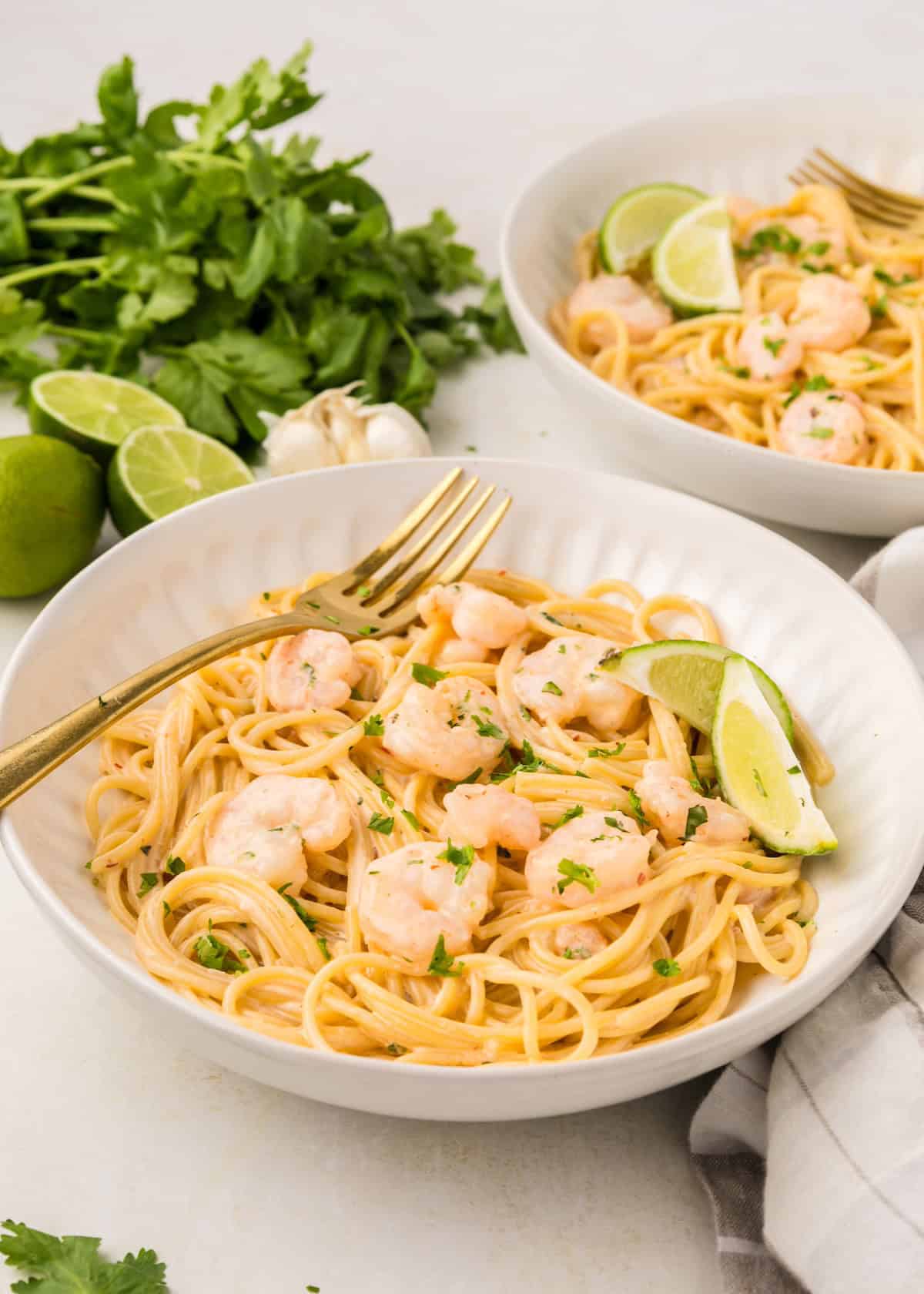 Bang Bang Shrimp Pasta served in bowls, topped with shrimp.