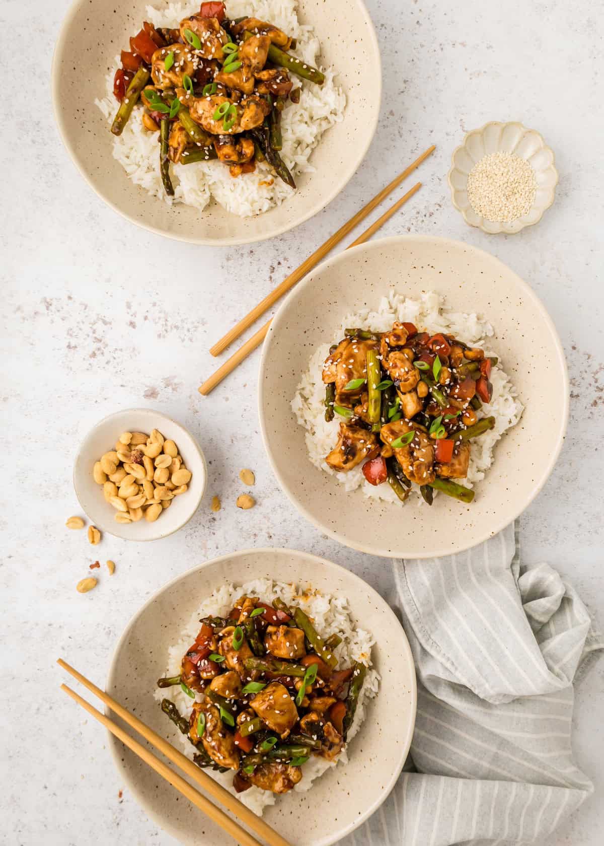 Top shot of bowls of Kung Pao Chicken.